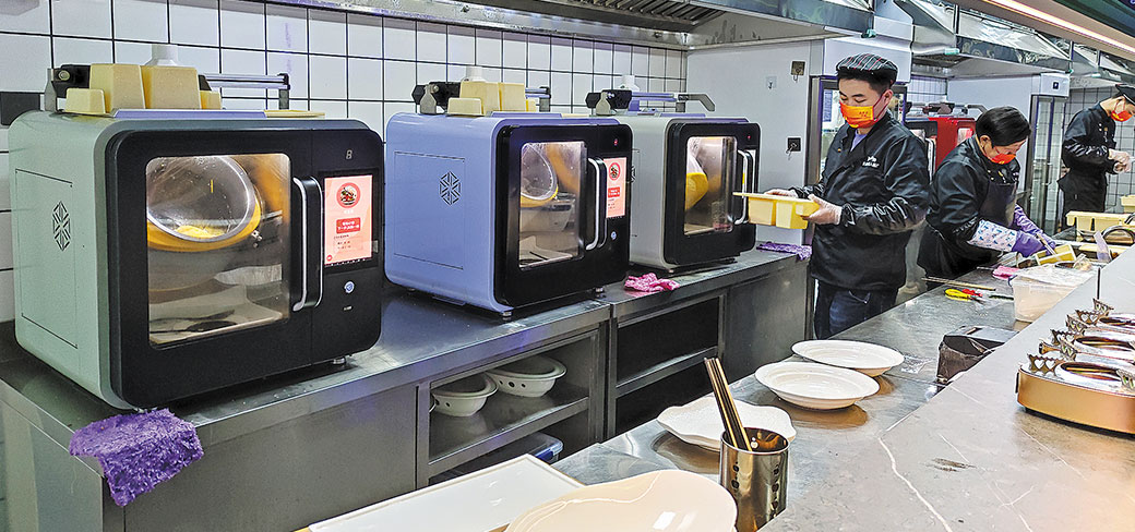 Un restaurant employant des robots producteurs de plats, en février 2023 à Nanchang, dans la province du Jiangxi. ZONG HUAN / FOR CHINA DAILY