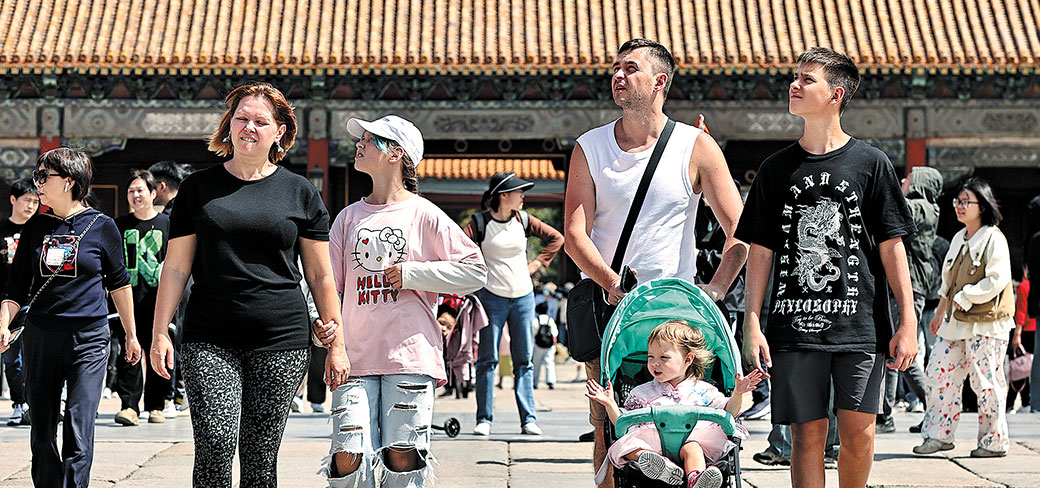 En visite au Musée du Palais à Pékin. PROVIDED TO CHINA DAILY